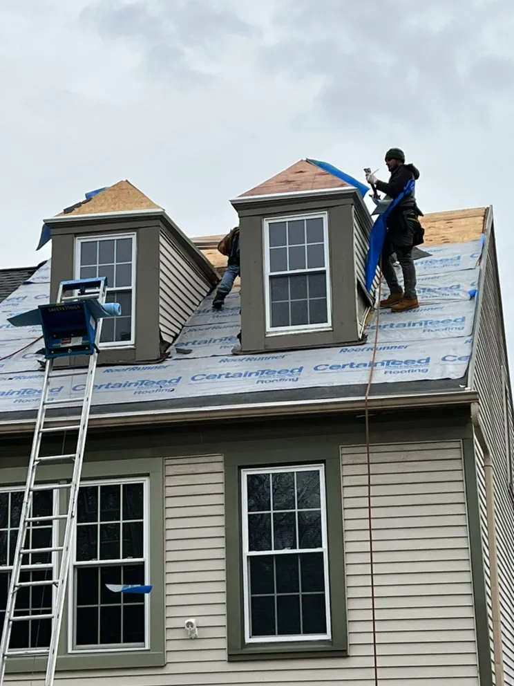 Slide of DMV Roofing and Restoration