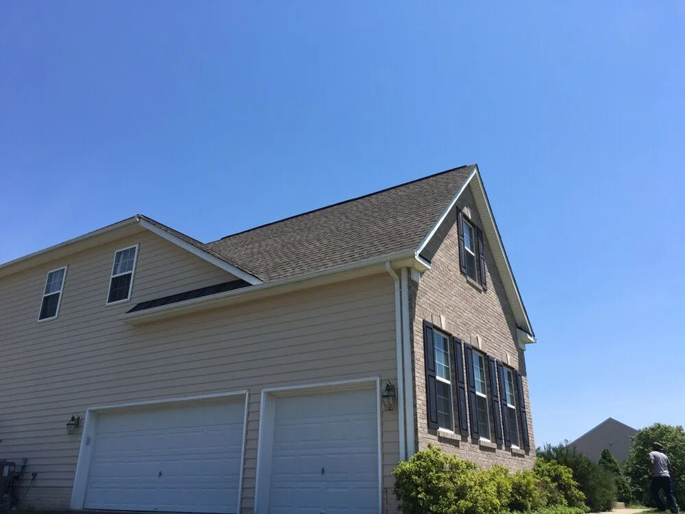 Slide of DMV Roofing