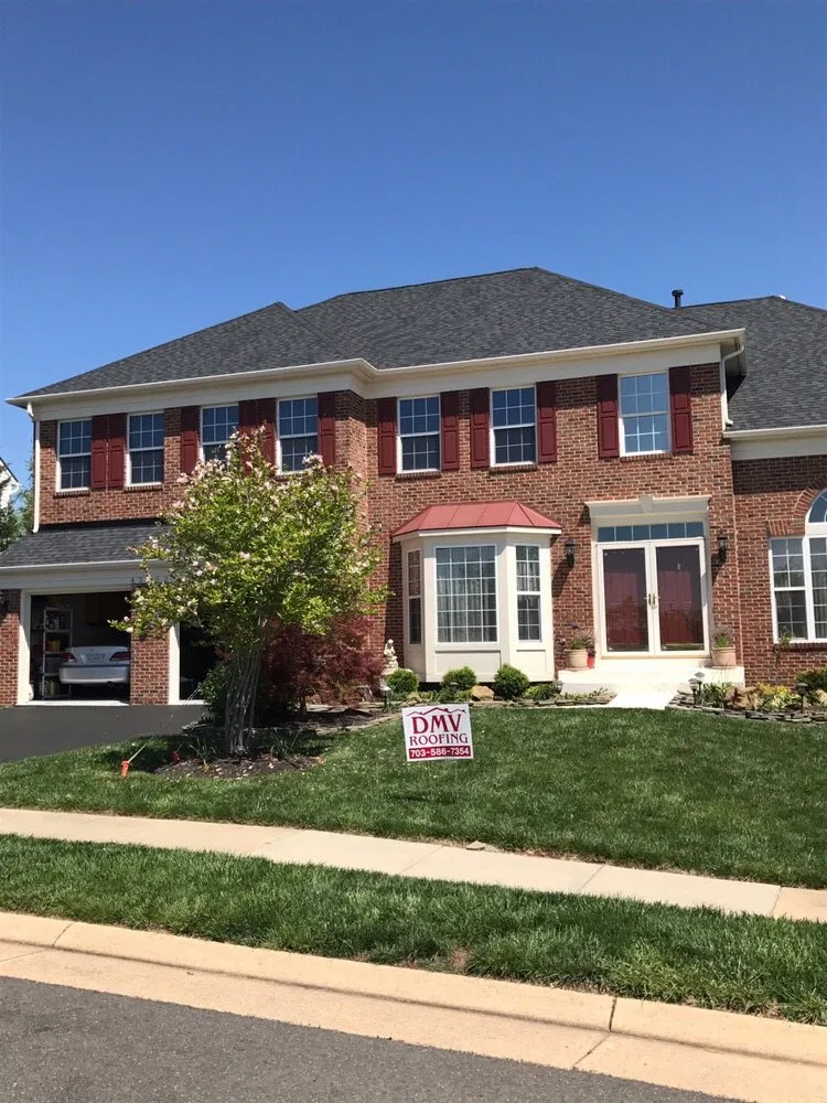 Slide of DMV Roofing