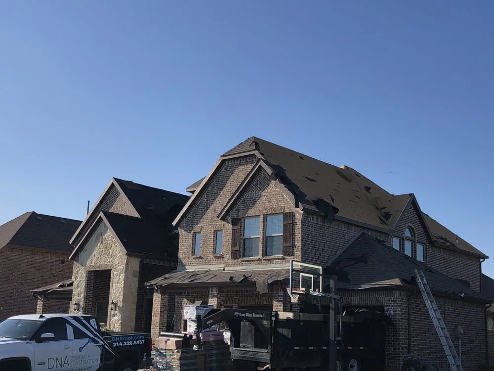 Slide of DNA Roofing & Construction