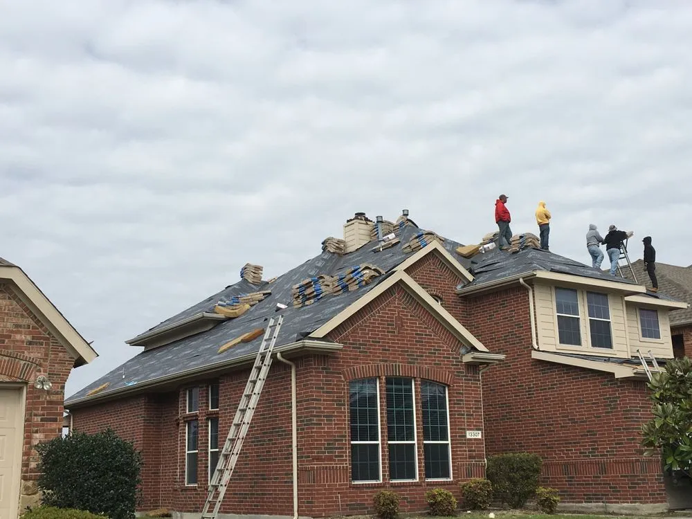 Slide of DNA Roofing & Construction