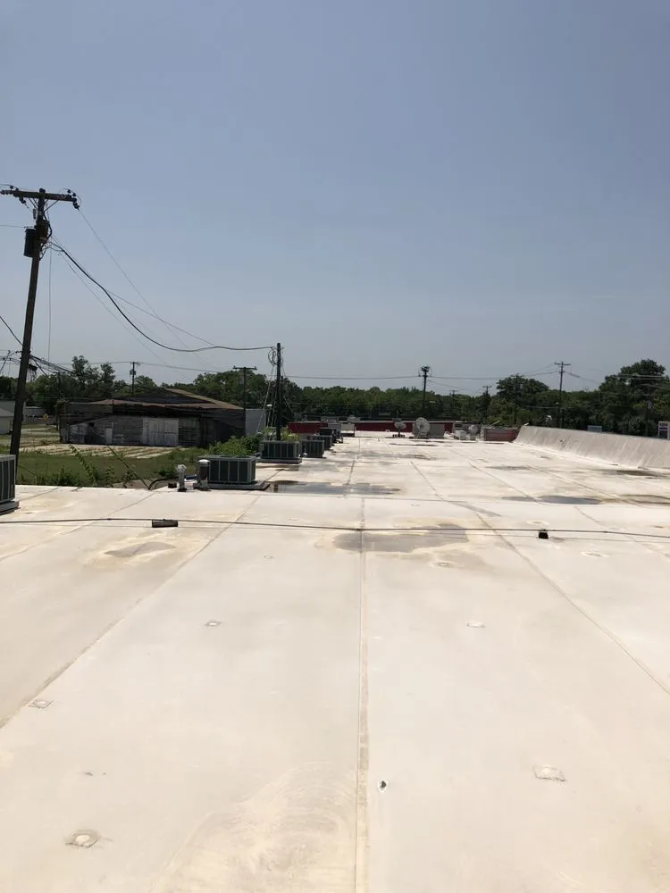 Slide of DNA Roofing & Construction