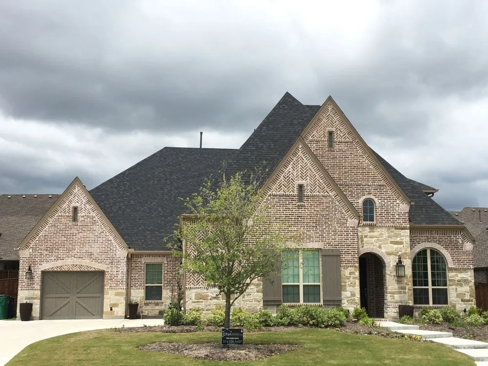 Slide of DNA Roofing & Construction