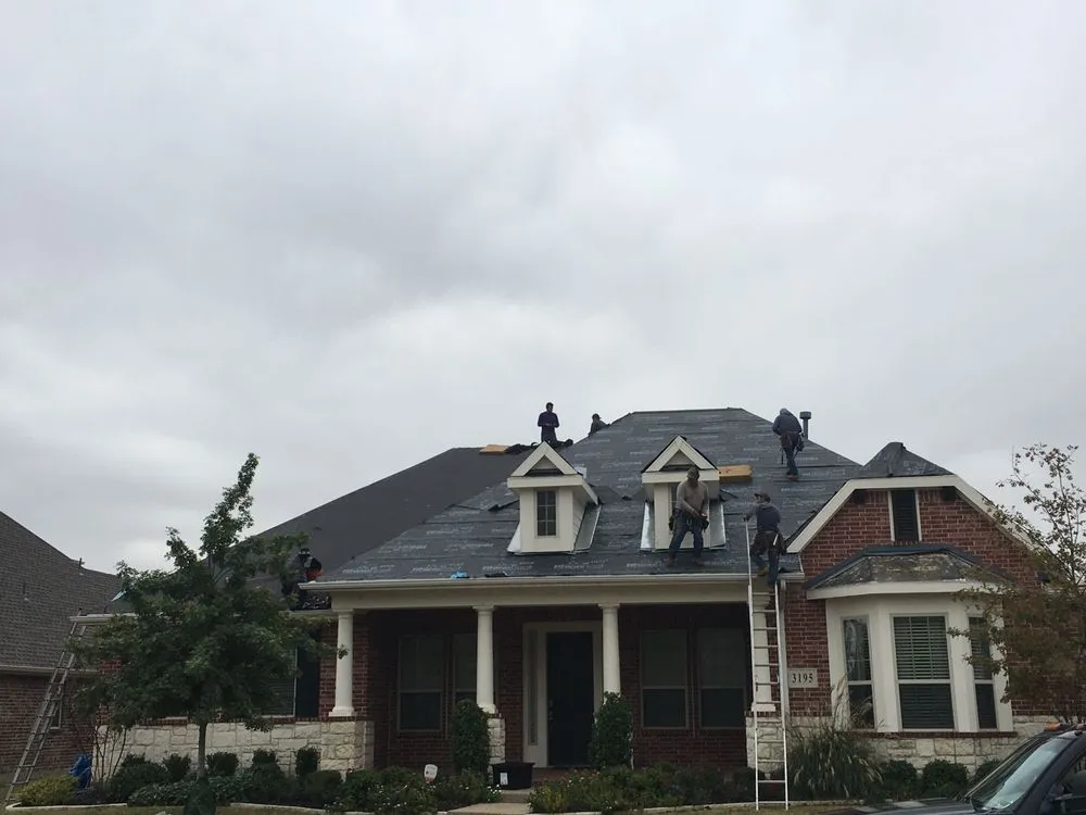 Slide of DNA Roofing & Construction