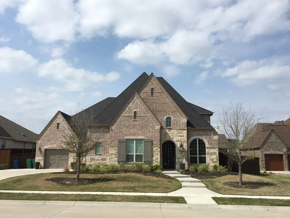 Slide of DNA Roofing & Construction