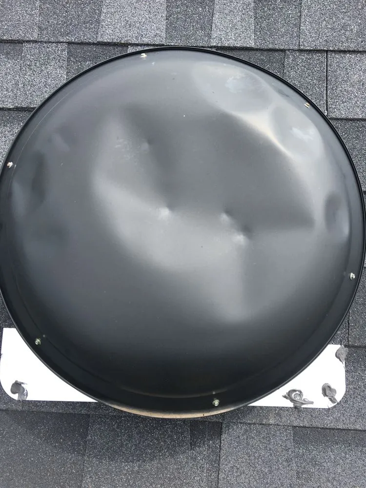 Slide of DNA Roofing & Construction