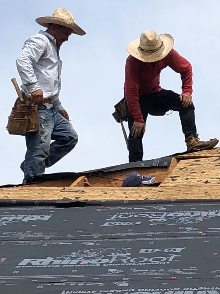 Slide of DNA Roofing & Construction