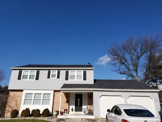 DNA Roofing and Siding Logo