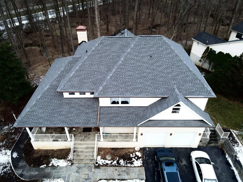Slide of DNB Roofing