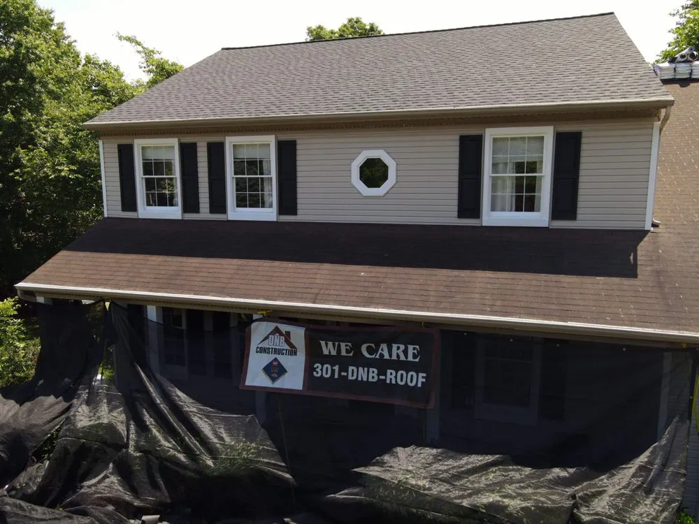 Slide of DNB Roofing