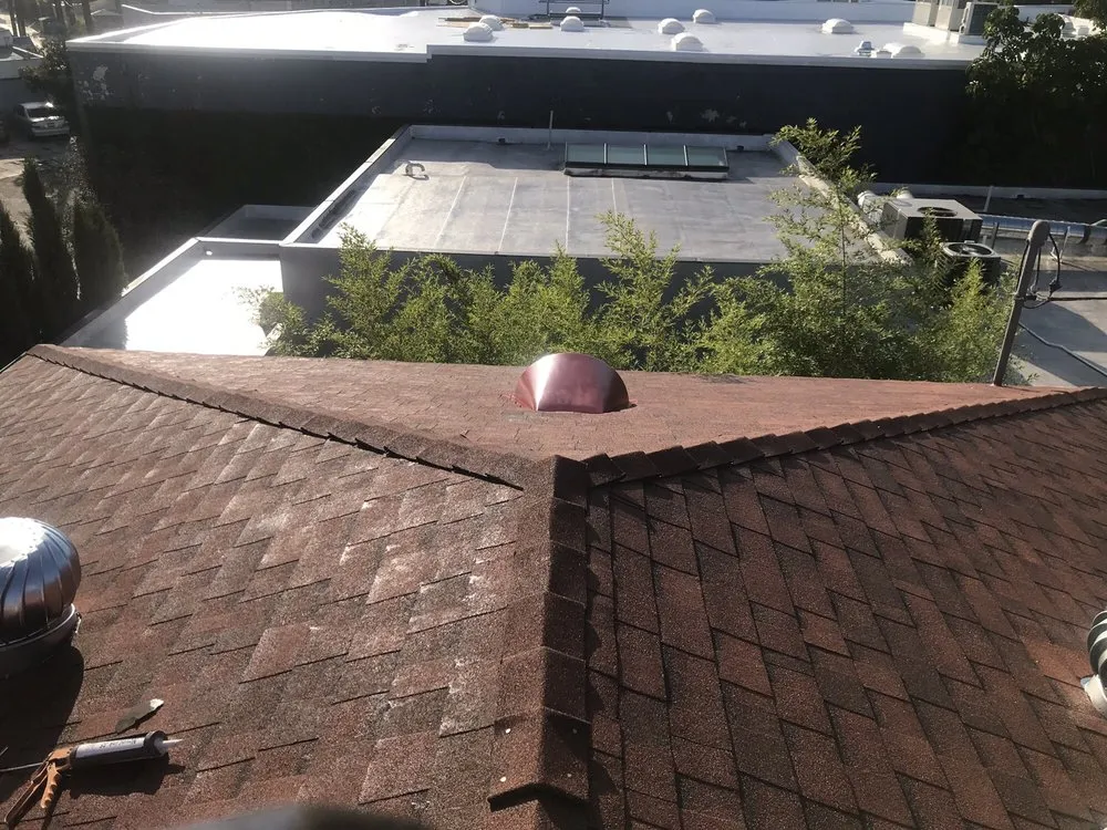 Slide of DNS Roofing