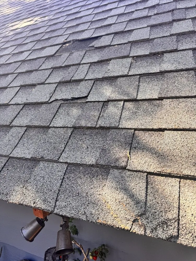 Slide of Do It All Roofing