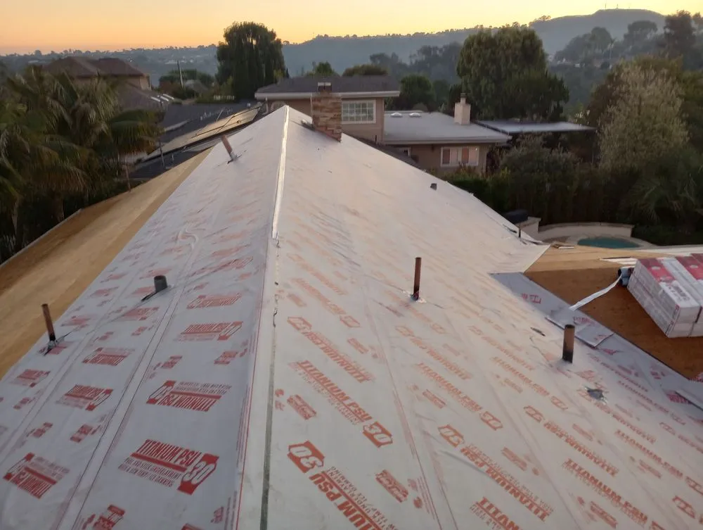 Slide of Do It Now Roofing