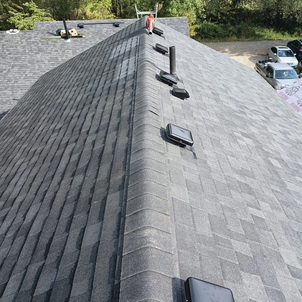 Slide of Dobro Roofing