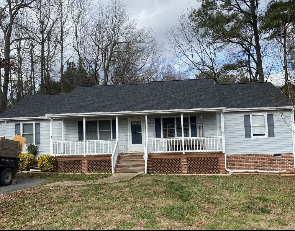 Slide of Doc's Roofing