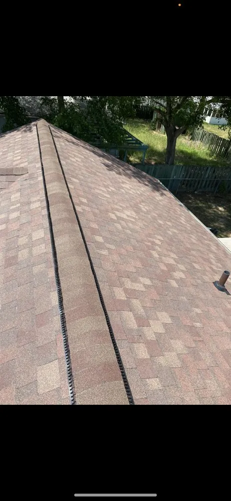 Slide of Doc's Roofing