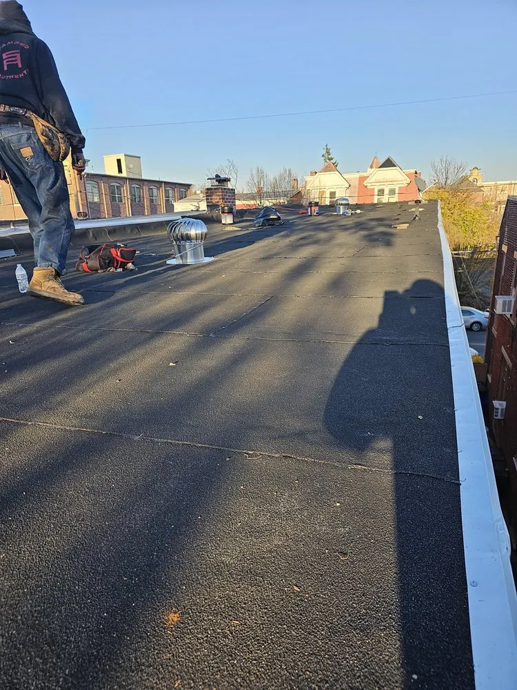 Slide of Doctor Roof Roofing