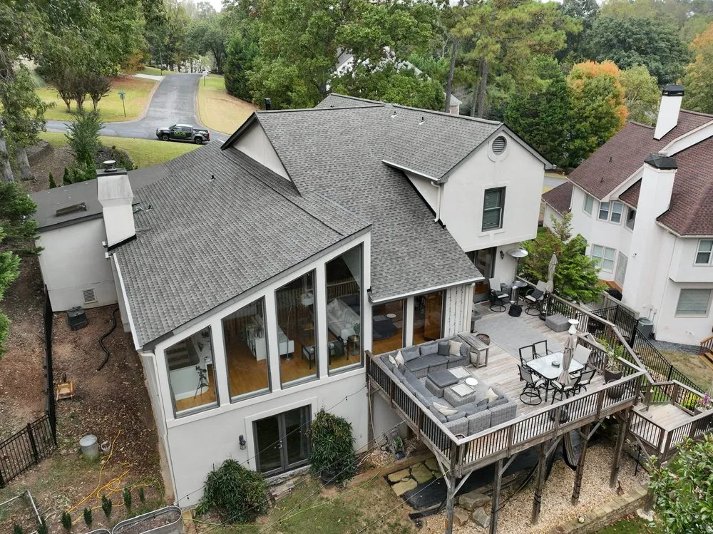 Slide of DOM Roofing & Restoration