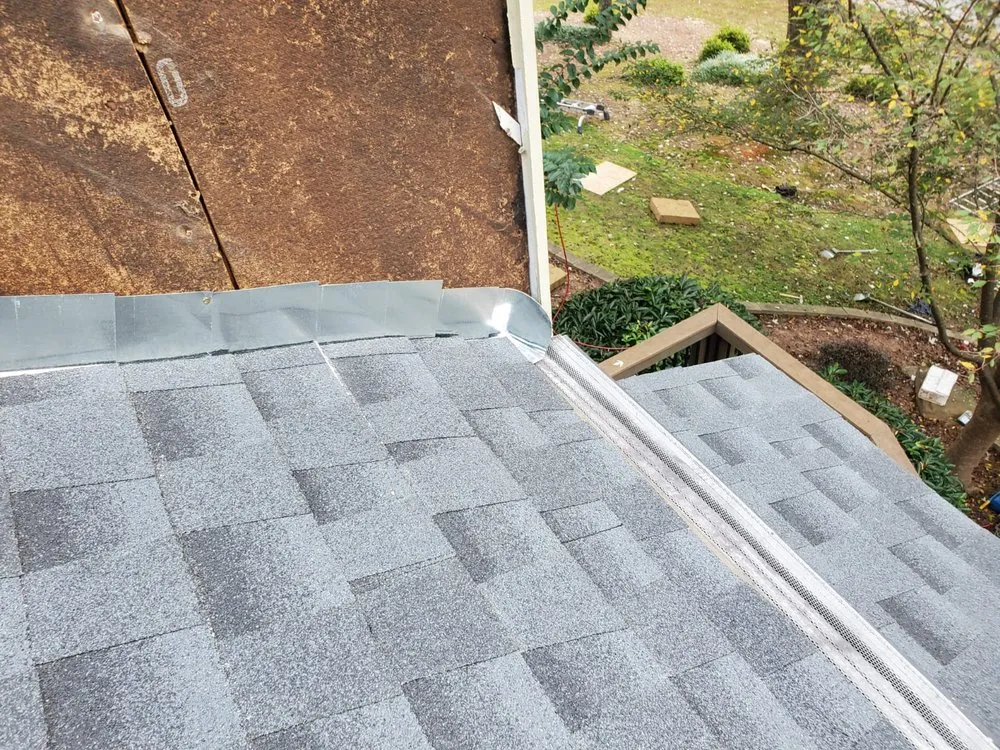 Slide of DOM Roofing & Restoration