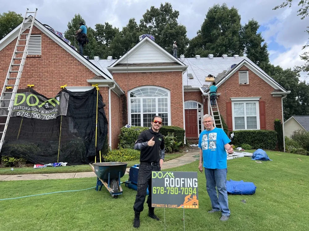 Slide of DOM Roofing & Restoration