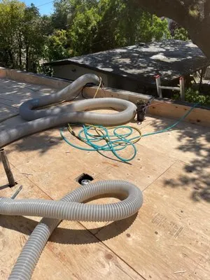 Dominguez Roofing Logo