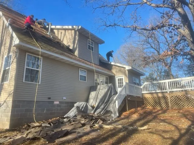 Slide of Domino Roofing