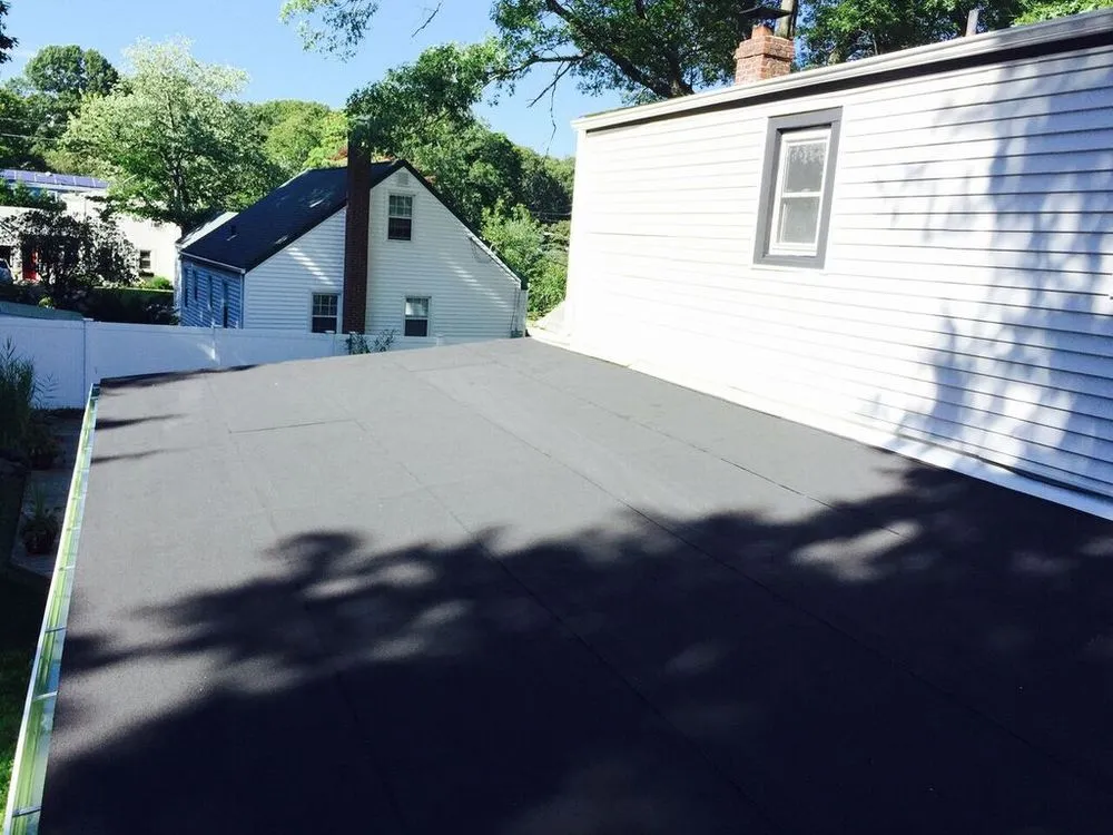 Professional storm damage roof repair in Long Island, NY by Done Right Flat Roof