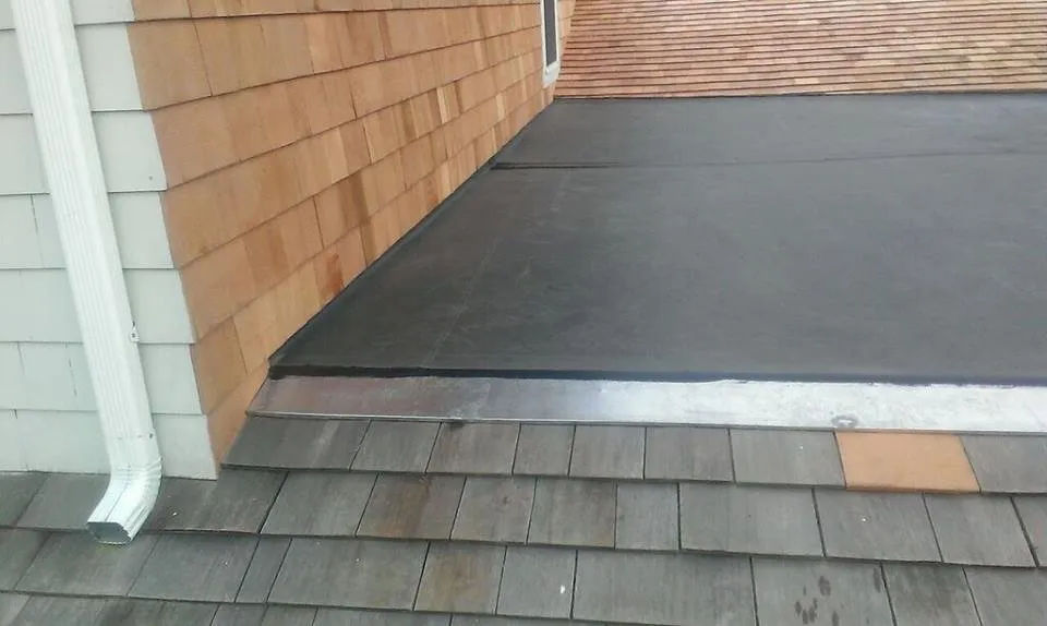 Top-rated roof repair after storm damage in Long Island, NY by Done Right Flat Roof
