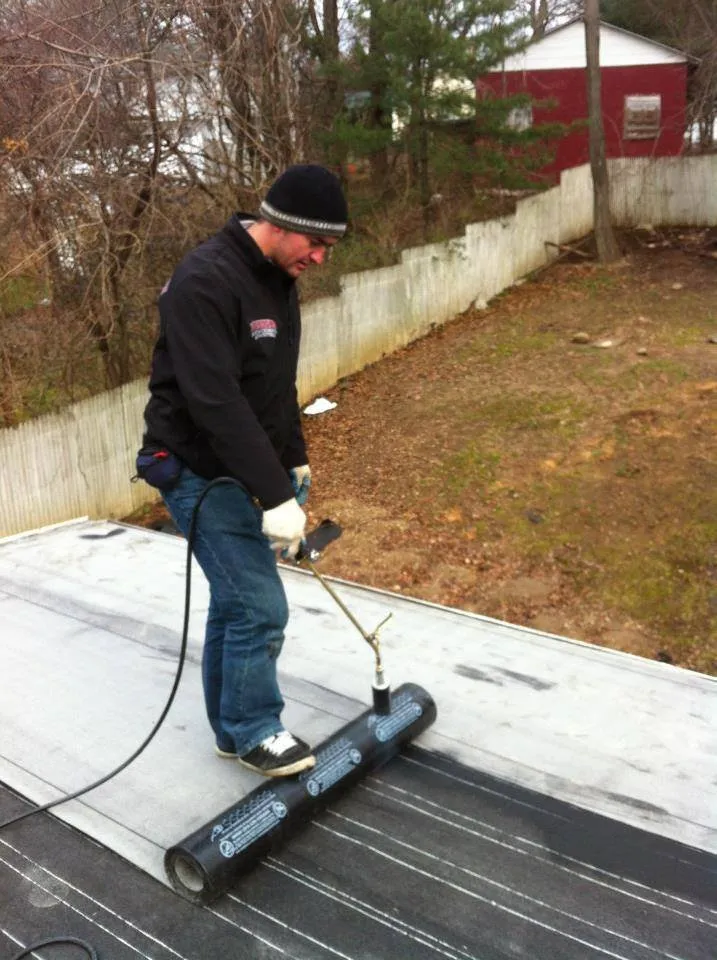 Professional shingle roofing service in Long Island, NY by Done Right Flat Roof
