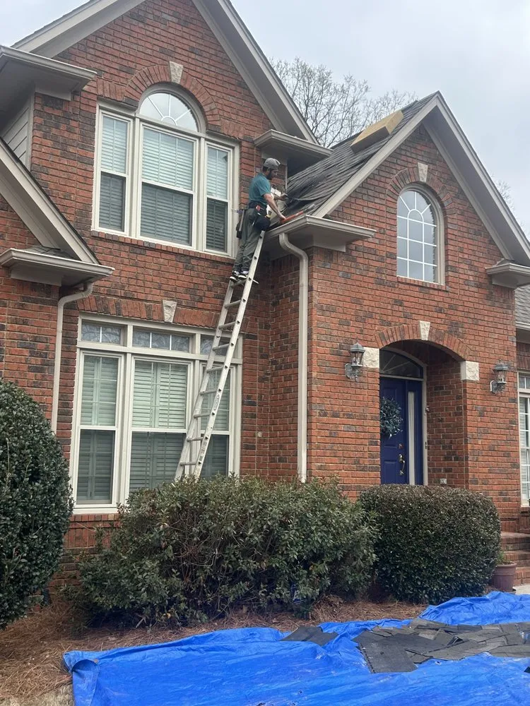 Slide of Dos Amigos Roofing