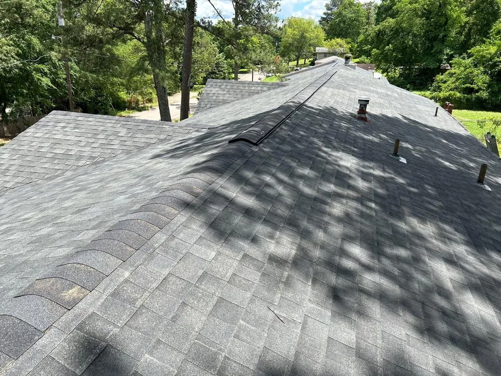 Slide of Dos Amigos Roofing