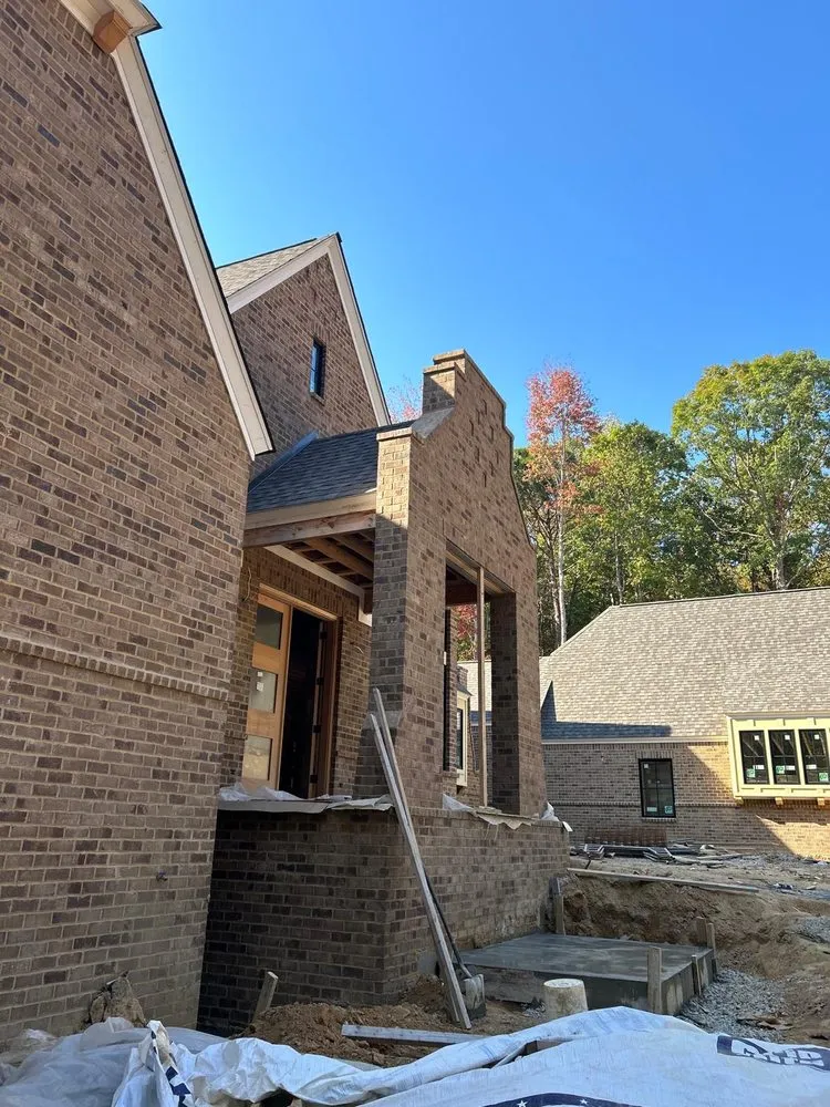 Slide of Dos Amigos Roofing