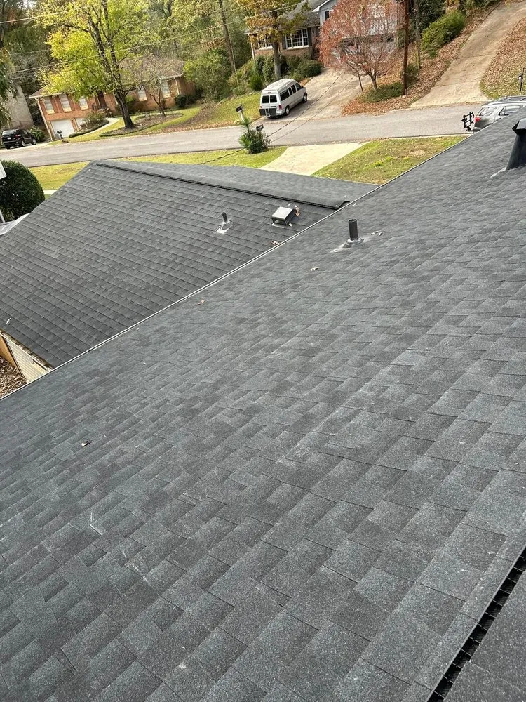 Slide of Dos Amigos Roofing