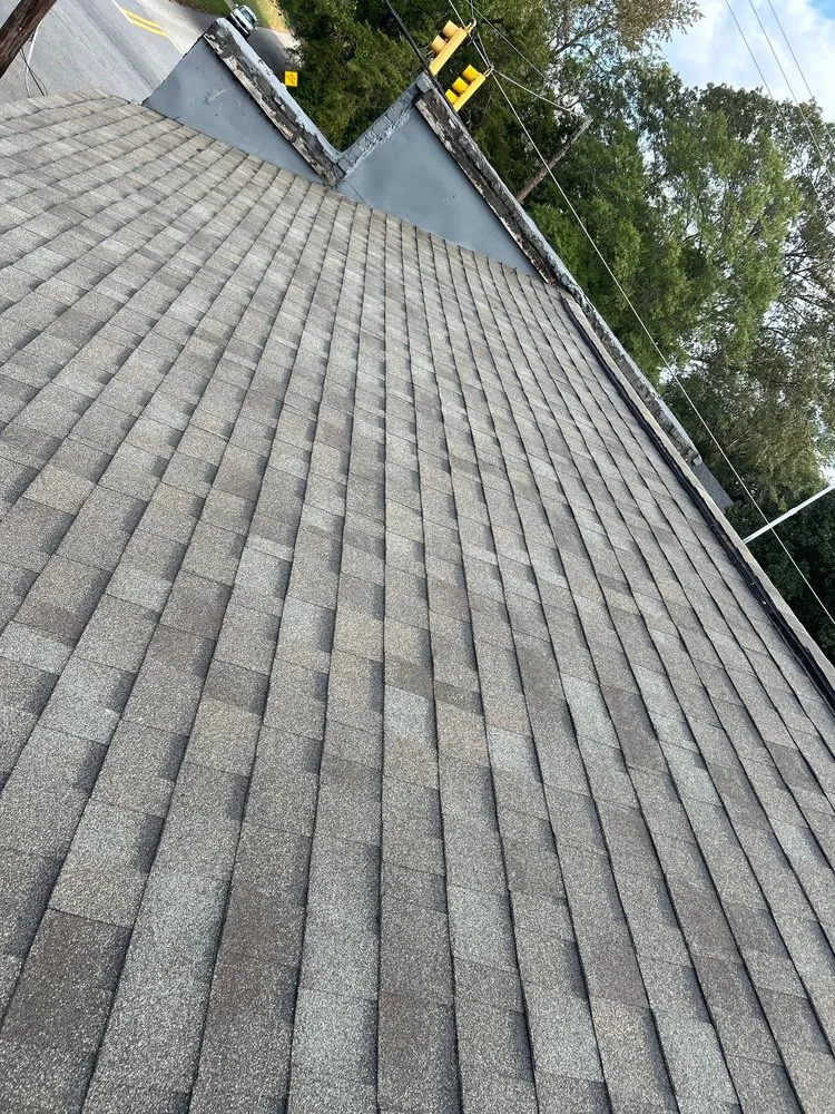 Slide of Dos Amigos Roofing