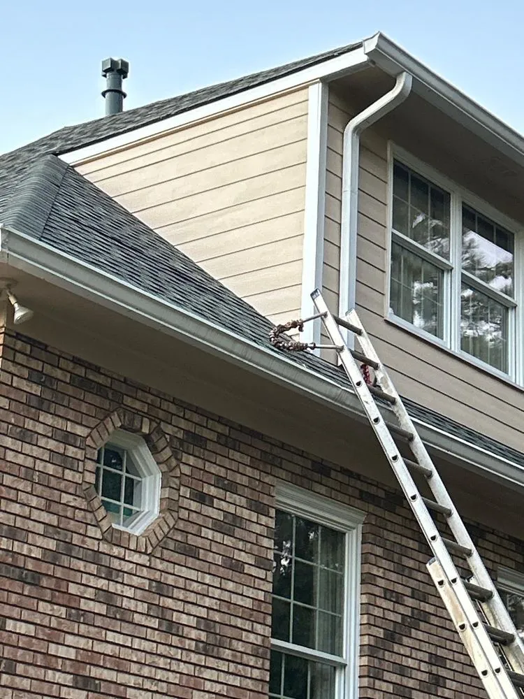 Slide of Dos Amigos Roofing