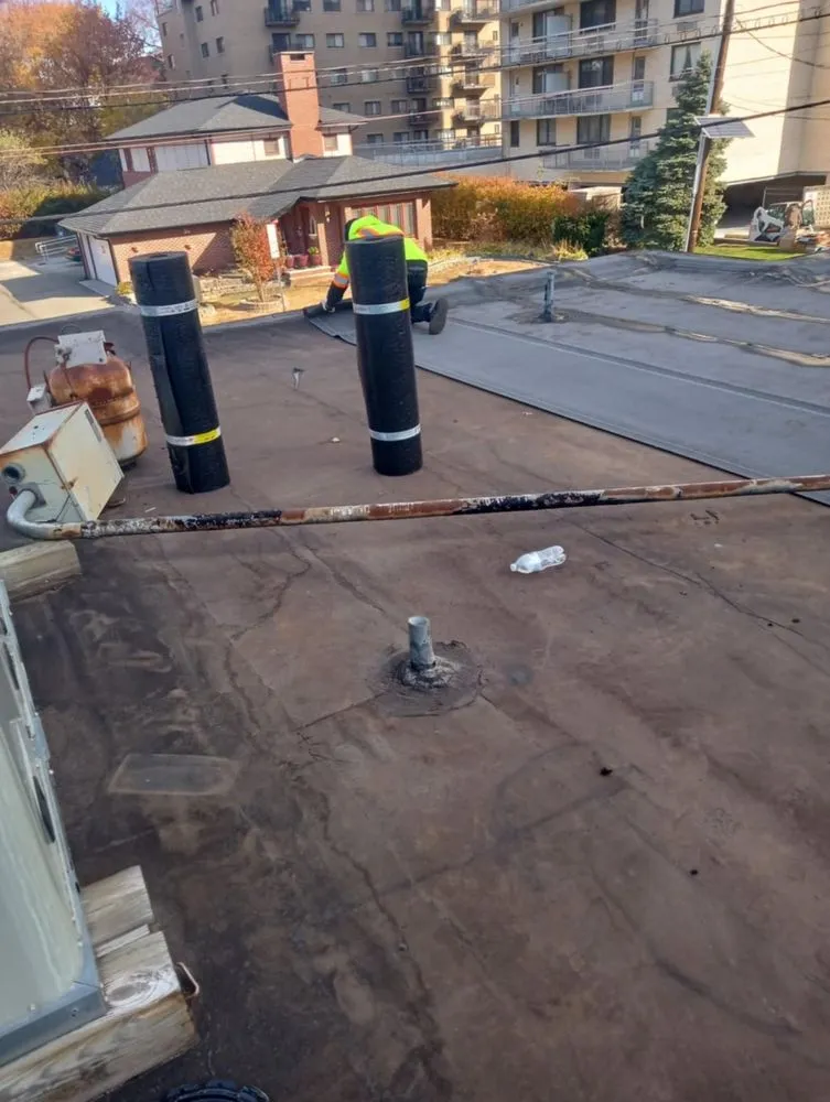 Slide of Dots General Construction & Roofing