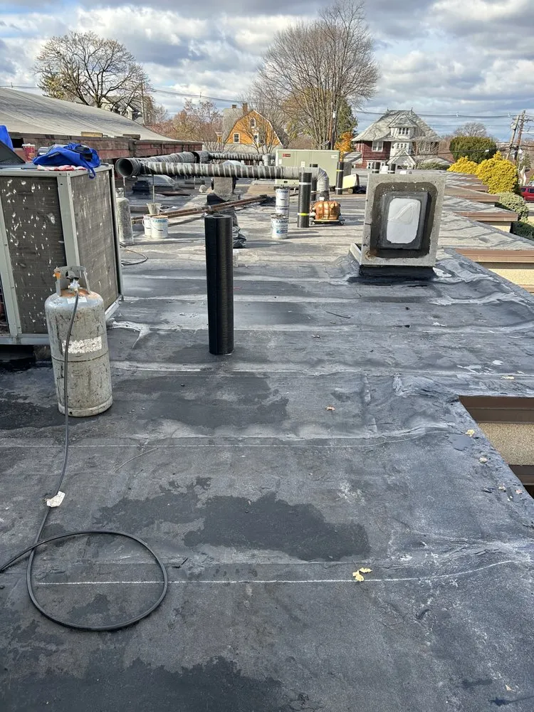 Slide of Dots General Construction & Roofing