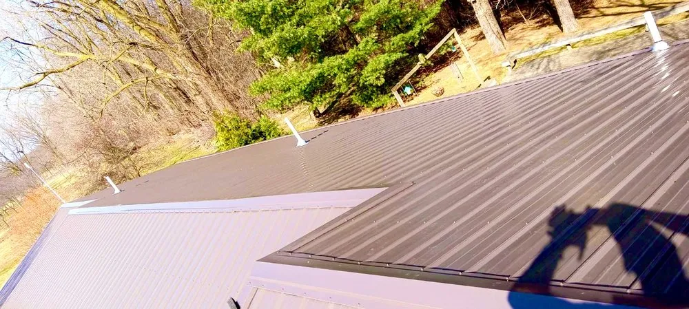 Local flat roof repair in Lawrence, MI by Double M Construction