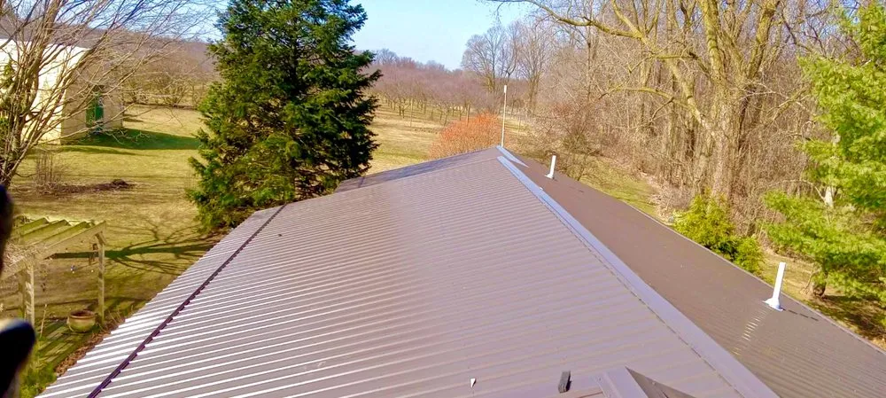 Top-rated flat roof repair with free inspection in Lawrence, MI by Double M Construction