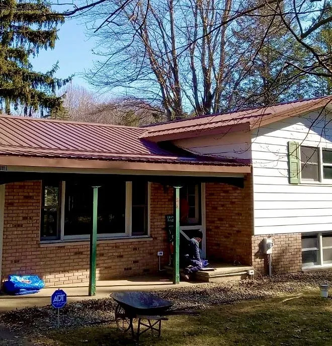 Emergency storm damage roof repair in Lawrence, MI - Double M Construction