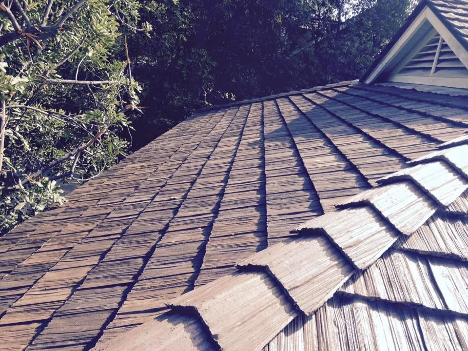 Slide of Douglas Cote Roofing