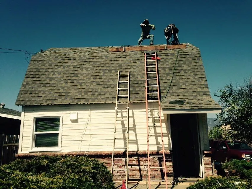 Slide of Douglas Cote Roofing