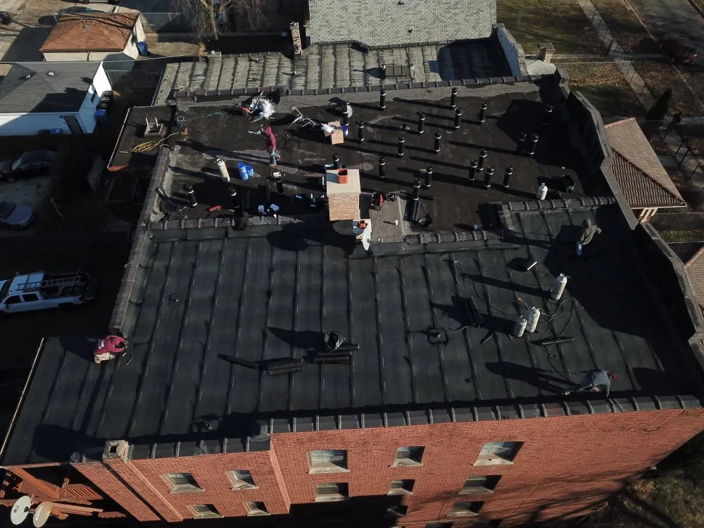 Slide of Doug’s Roofing