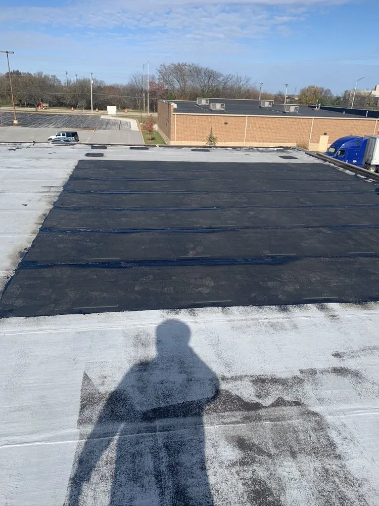 Slide of Doug’s Roofing