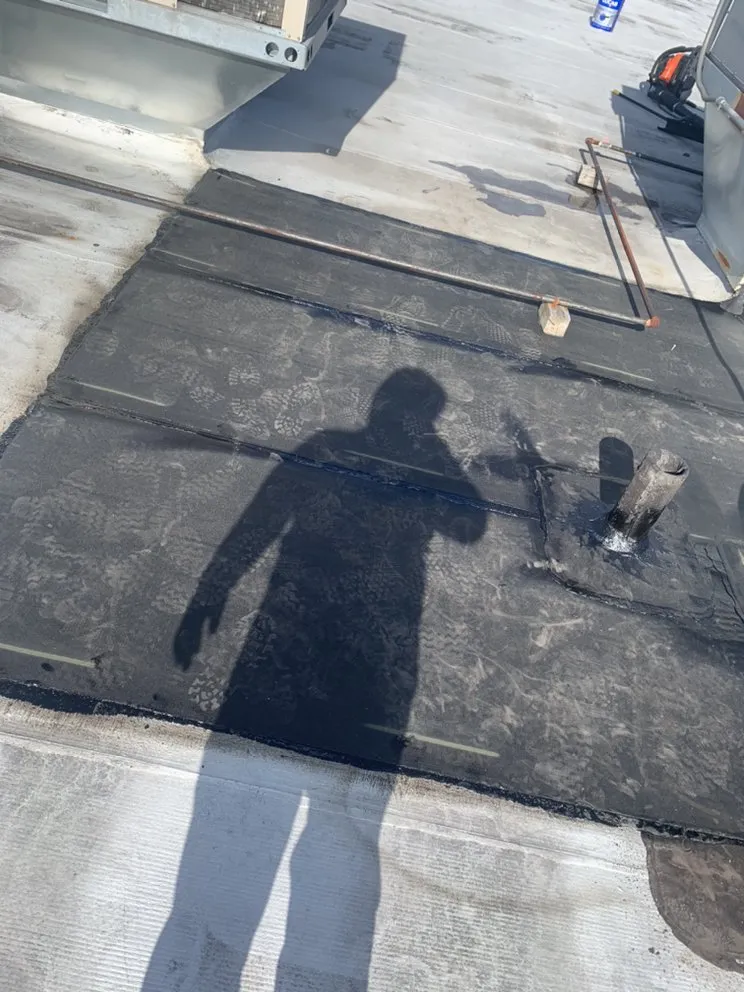 Slide of Doug’s Roofing