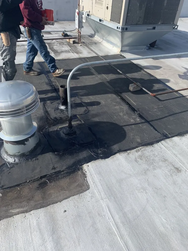 Slide of Doug’s Roofing