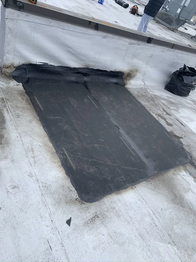 Slide of Doug’s Roofing