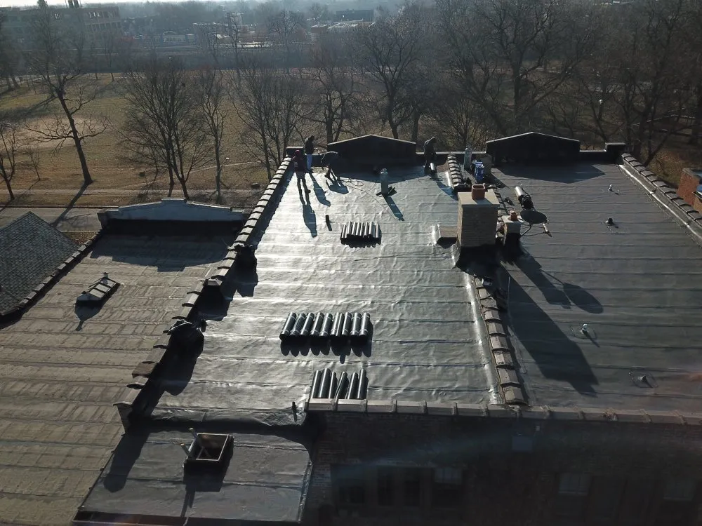 Slide of Doug’s Roofing