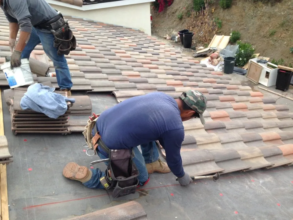 Slide of Dowd Roofing