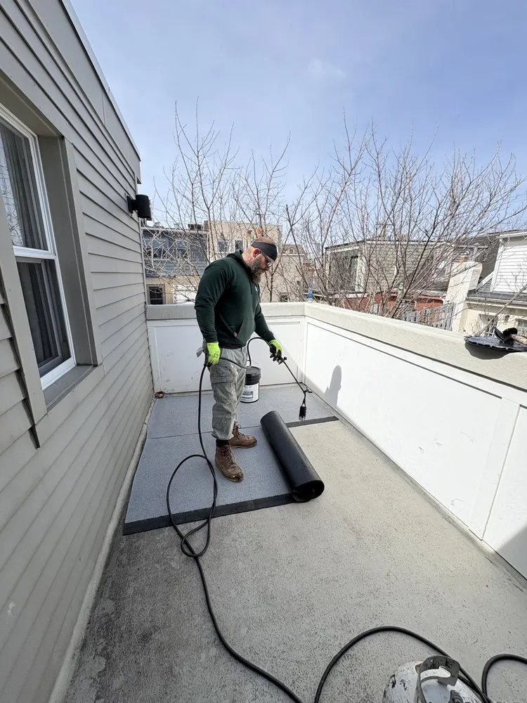 Slide of Doyle Roofing Company